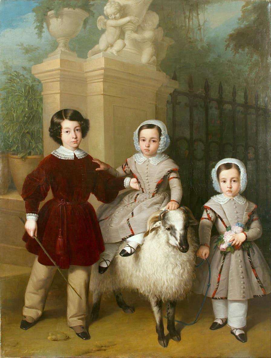  children playing with a ram 