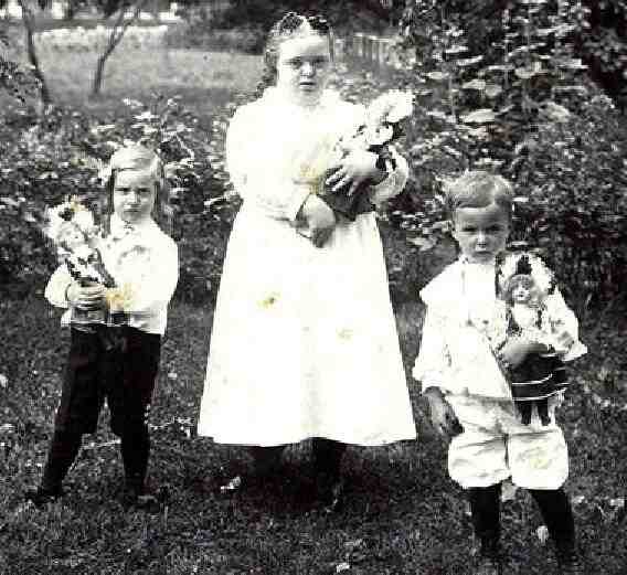 boys playing with dolls