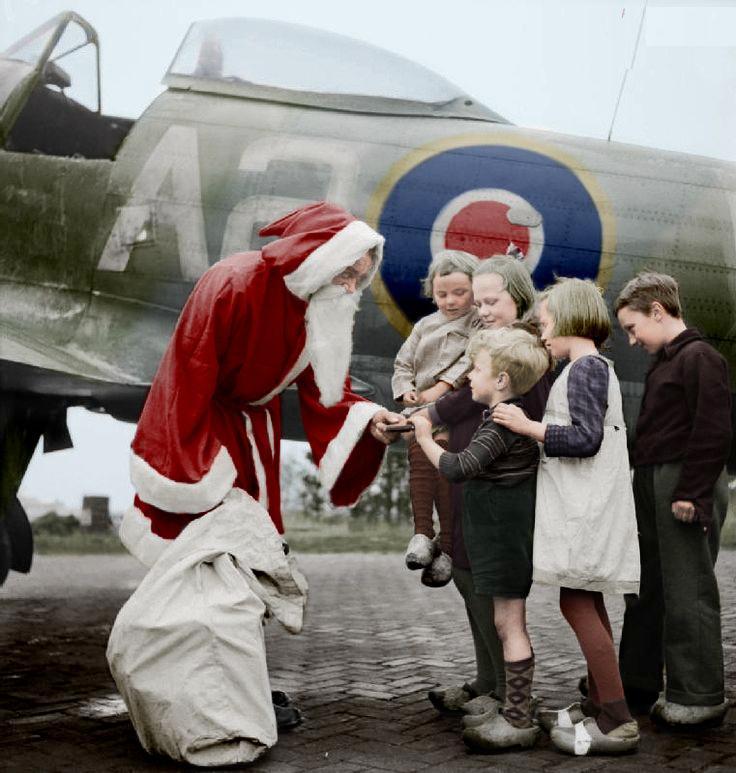 RAF aviators playing Sinterklaas to Duch childre