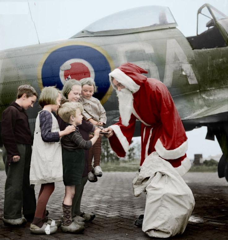 RAF aviators playing Sinterklaas to Duch childre